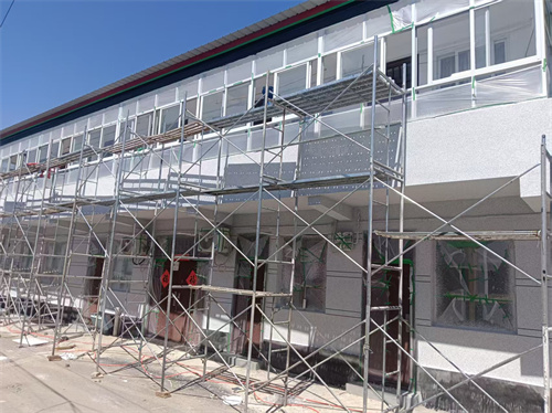 北京大兴青云店自建房外墙水包砂仿石漆案例